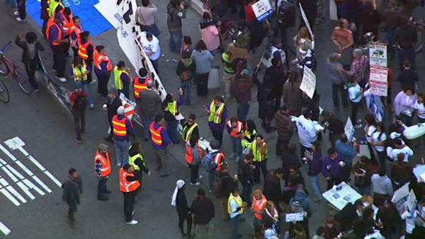 Occupy Los Angeles protesters marched through the Financial District in downtown Los Angeles on Thursday, Nov. 17, 2011, demanding that banks increase lending to small businesses and pay more in taxes.
