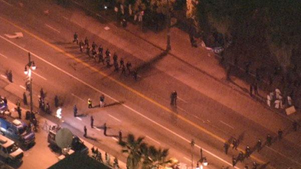 Los Angeles police officers moved in on the Occupy Los Angeles encampment and began arresting protesters who defied an eviction notice on Wednesday Nov. 30, 2011.