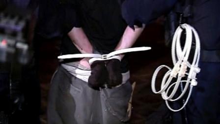Police officers were seen cuffing the hands of Occupy Los Angeles protesters with white plastic zip-ties on Wednesday, Nov. 30, 2011.