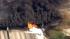 A tanker truck caught fire Wednesday on the...