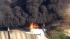 A tanker truck caught fire Wednesday on the...