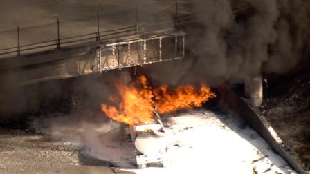 A tanker truck caught fire Wednesday, December 14, 2011, on the eastbound 60 Freeway in Montebello, forcing the closure of the freeway and an overcrossing.