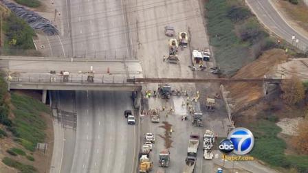 Traffic is moving again on the 60 Freeway after the tanker fire, but more delays are expected as crews tear down the other half of the torched Paramount Boulevard bridge starting Sunday night.