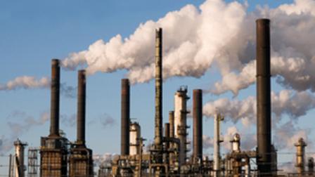 A generic file photo of smokestacks.