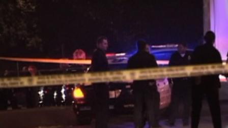 Police investigate at a crime scene in Wilmington.