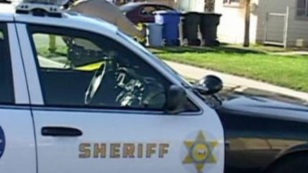 Authorities investigate the scene of a shooting in Hawaiian Gardens on Thursday, March 8, 2012.
