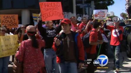 A throng of teachers and other LAUSD employees showed up at district headquarters near downtown Los Angeles to protest cuts on Tuesday, March 13, 2012.