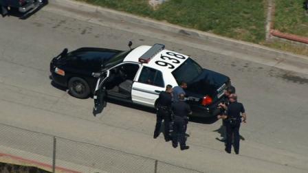 Glendale police officers take a suspect into custody on Tuesday, April 4, 2012. Four suspects fled into the neighborhood after a brief pursuit.