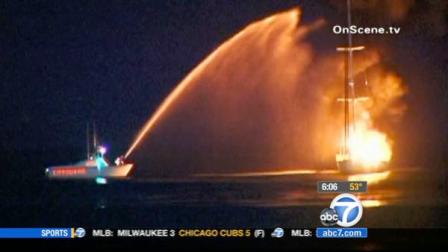 Crews are shown battling a fire that erupted on a boat off the Malibu coast on Tuesday, April 3, 2012.