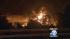 A tanker truck carrying nearly 9,000 gallons of...