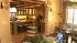 The kitchen is a study in contrasts, from a...