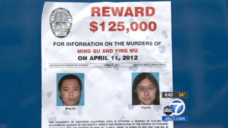 A flyer announcing the $125,000 reward for the gunman who fatally shot two USC grad students is seen in this April file photo.