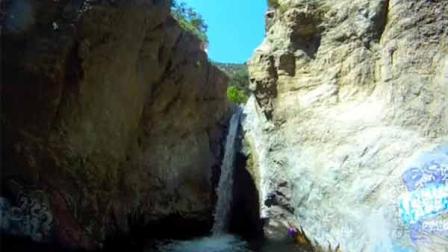 A waterfall in Eaton Canyon is shown in this still image from YouTube.com.