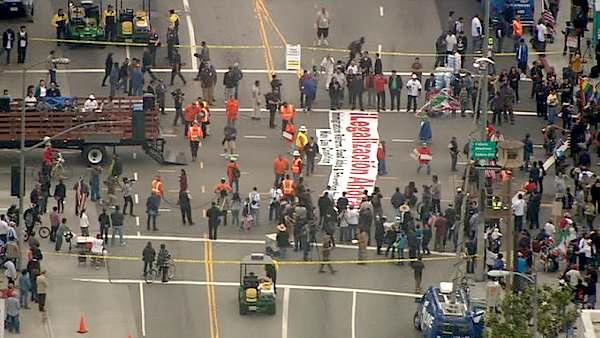 Demonstrators assemble at South Broadway and Olympic Boulevard in downtown Los Angeles prior to their May Day march on Tuesday, May 1, 2012.