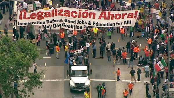 Demonstrators prepare for their May Day march down Broadway in downtown Los Angeles on Tuesday, May 1, 2012.