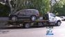 A car gets towed after decomposing remains were found inside in West Hollywood on Saturday, June 9, 2012.