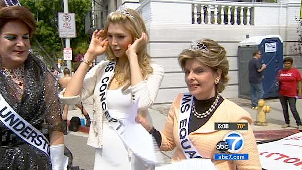 Jenna Talackova (center), a transgender Canadian beauty queen, and attorney Gloria Allred (right) at the 42nd annual L.A. Pride Parade held in West Hollywood on Sunday, June 10, 2012.