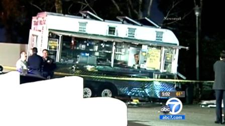 Police tape ropes off the scene of a deadly car crash involving a taco truck in Boyle Heights on Saturday, June 16, 2012.