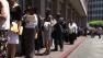 People are seen standing in line for a job fair in the Los Angeles area in this undated photo.