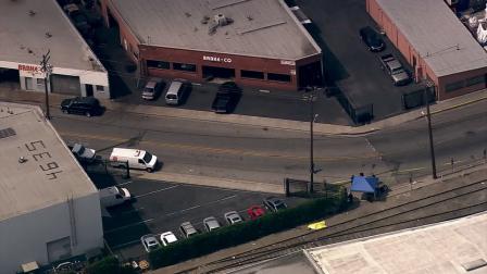Authorities investigate after a body was found near railroad tracks in the city of Vernon on Monday, July 2, 2012.