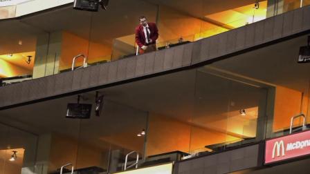 A security guard looks down from where a young boy fell to where a second security guard stands following the Los Angeles Lakers NBA basketball game against the Golden State Warriors at Staples Center, Sunday, Nov. 21, 2010, in Los Angeles.