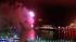 Fireworks are seen in the sky near the Queen...