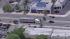 A pursuit vehicle is seen spinning out of...