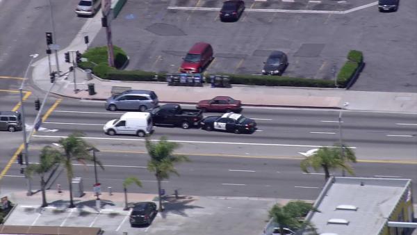 A CHP cruiser is seen rear-ending a truck during a high speed pursuit in the South Bay area on Tuesday, July 10, 2012.