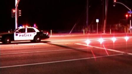 A patrol car is parked at the scene where a woman was struck and killed in a hit-and-run crash on Pacific Coast Highway in Santa Monica on Tuesday, July 10, 2012.
