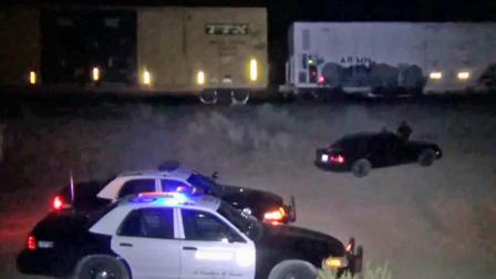 Patrol cars are shown at the scene of a train accident in Littlerock, Calif. on Saturday, July 14, 2012.