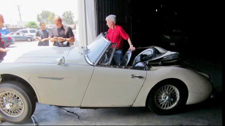 Robert Russell stands next to his 1967 Austin Healey, which he recovered 42 years after it was stolen.
