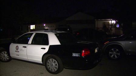 A police patrol car is parked at the scene of a fatal shooting in North Hollywood on Tuesday, July 17, 2012.