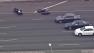 A CHP officer is seen arresting a pursuit suspect after a motorcycle chase Tuesday, July 24, 2012.