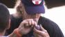 A man in seen smoking medical marijuana in public in this undated file photo.