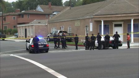 Police investigate after a pursuit suspect crashed into a church in Inglewood on Wednesday, Aug. 1, 2012.