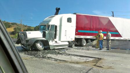 A big rig is seen after it crashed into the center divider on the eastbound 101 Freeway in Calabasas on Saturday, August 11, 2012.
