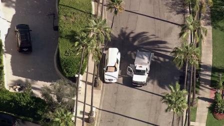 Beverly Hills police found two bodies inside a parked hearse on Monday, Aug. 13, 2012. One body was in a casket in the back and the other was in the drivers seat.