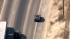 A car is seen speeding on the freeway during a...
