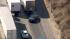A car is seen weaving out from behind several...
