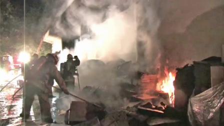 Firefighters battle a blaze at the San Fernando Aquatic Center in Woodland Hills on Friday, Aug. 31, 2012.