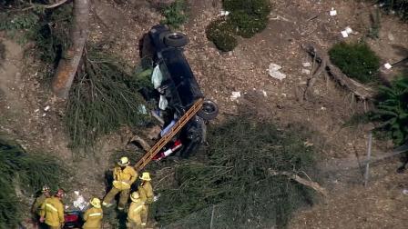 Firefighters respond to the scene of a fatal accident off the 710 Freeway in Lynwood on Monday, Sept. 3, 2012.