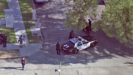 An LAPD patrol vehicle is shown near the scene of a SWAT standoff in Canoga Park on Thursday, Sept. 6, 2012.