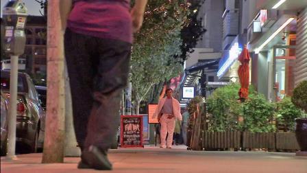 People are seen walking in Downtown L.A. in this undated file photo.