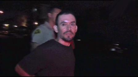 Juan Diego Valencia, 30, is taken into custody after allegedly leading authorities on a pursuit through the Lynwood area and barricading himself in an apartment complex in Hawthorne on Friday, Sept. 7, 2012.