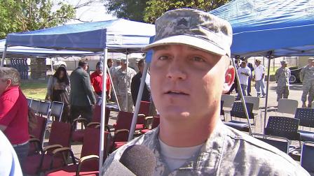 Sgt. James Bennett, seen in this Saturday, Sept. 8, 2012 photo, received the Soldiers Medal for saving two kids from a burning car.