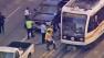 Four people were injured when a car crashed into a Metro Blue Line train in downtown Los Angeles on Friday, Sept. 14, 2012.