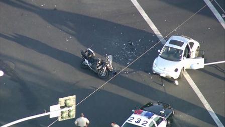 A South Gate police officer was taken to Los Angeles County-USC Medical Center Wednesday, Sept. 19, 2012, after his motorcycle collided with a Volkswagen in Industry.