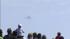Endeavour flies over Queen Mary in Long Beach :: Crowds watch space shuttle Endeavour fly over the Queen Mary in Long Beach on Friday, Sept. 21, 2012.