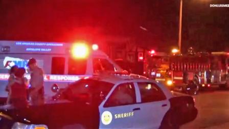 An ambulance is seen transporting a teenager who was found with multiple gunshot wounds in Palmdale on Monday, Sept. 24, 2012. He was later pronounced dead at the hospital.