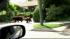 A mama bear and baby bear wandered around near...